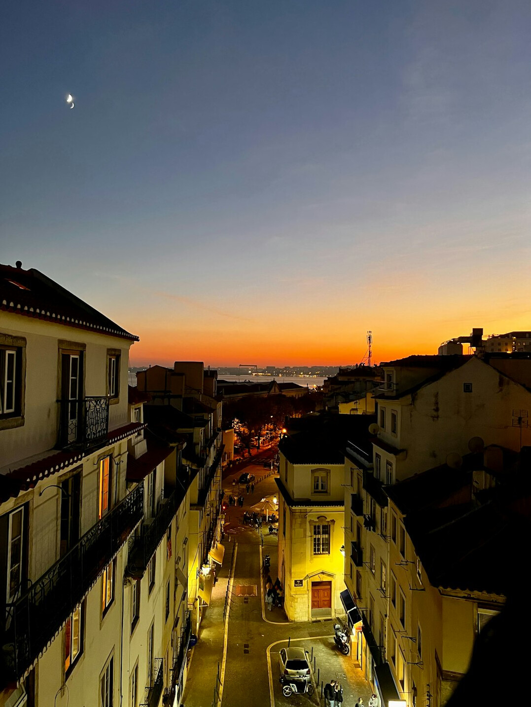 Row of aging residential apartment buildings in a Lisbon neighbourhood at dusk