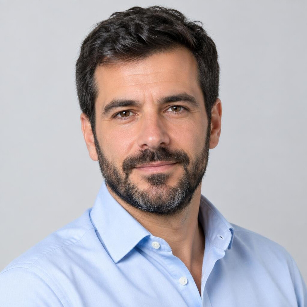 Portrait of a Portuguese man journalist with a beard